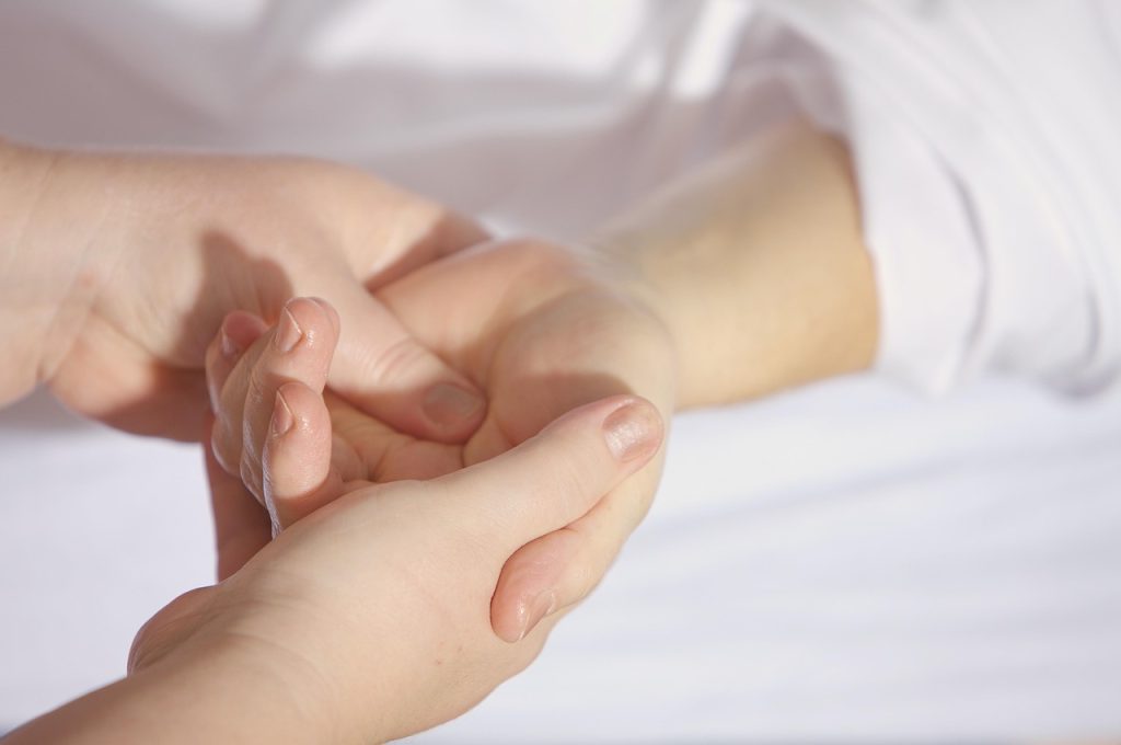 Hands, massage, treatment — CBD for Pain Relief