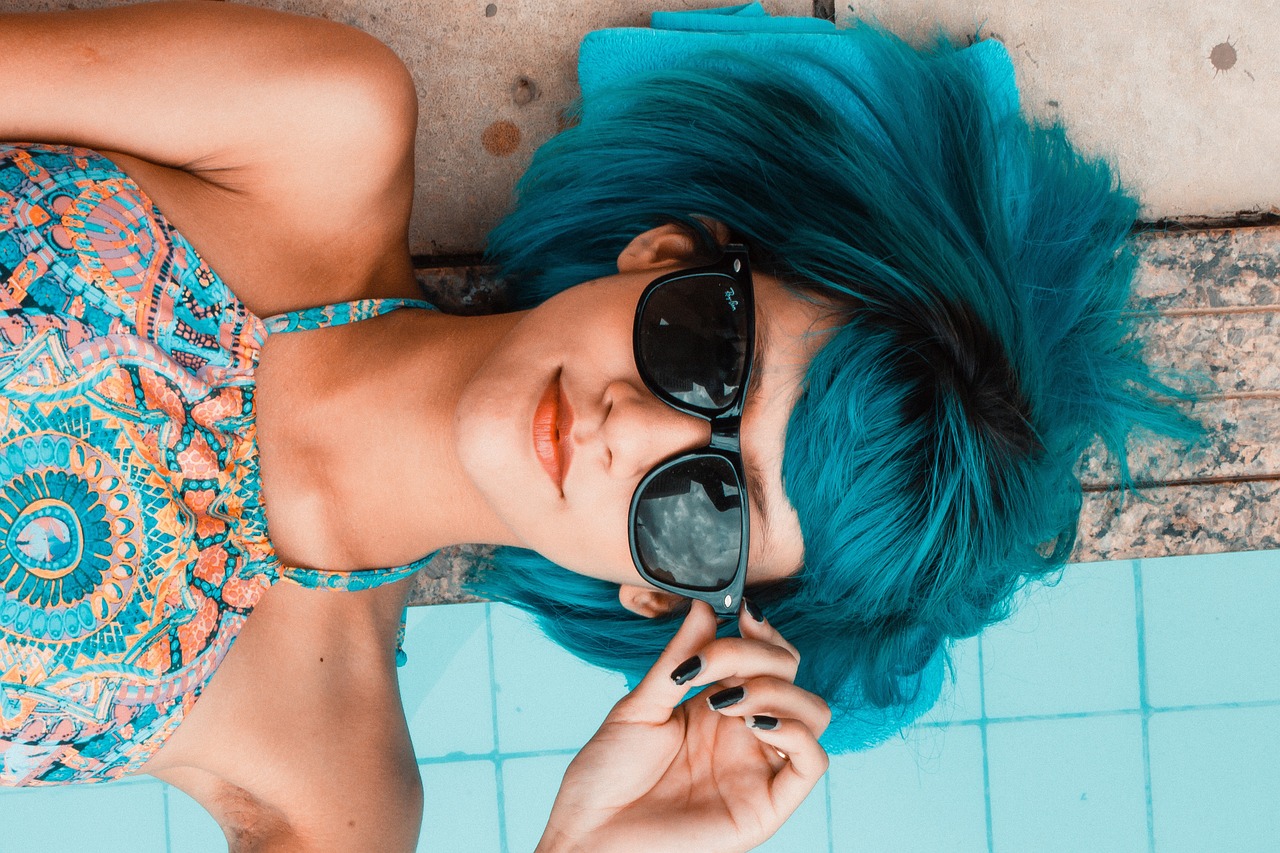 Sunglasses, woman, pool — How to Choose the Right Pearl Strand Length to Match with Right Neckline?