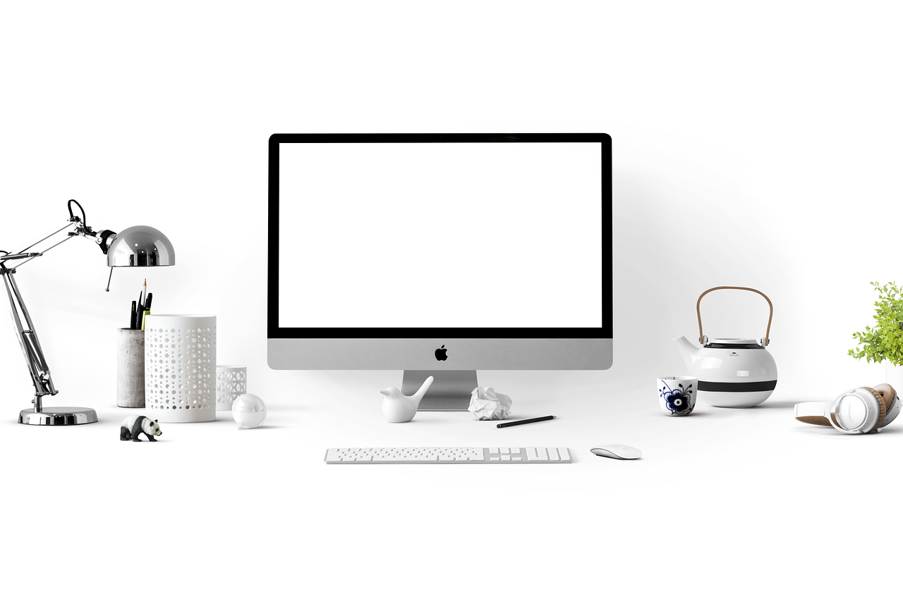 Apple, computer, desk — Requirement of Professional Knowledge of Bonds Agents to Procure bail bonds in bay minette al
