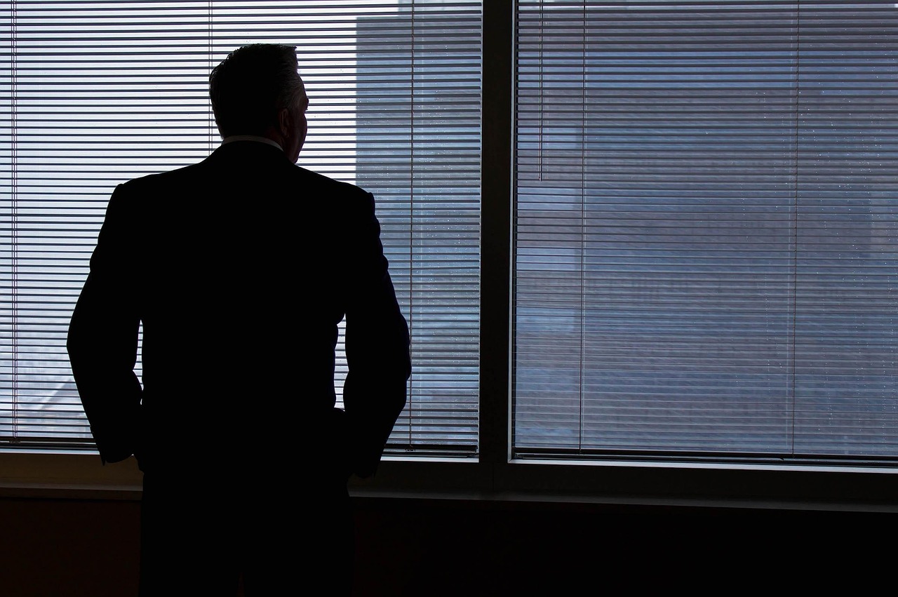 Businessman, silhouette, windows — Unveiling the Value of Diamonds: Finding Deals with Rare Carat for Your Perfect Engagement